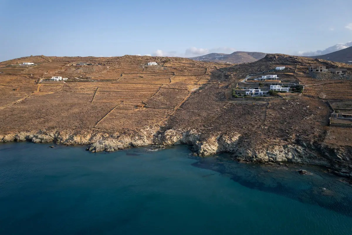 Houses and agricultural terraces near the coastline, Agios Sostis, Tinos, Greece